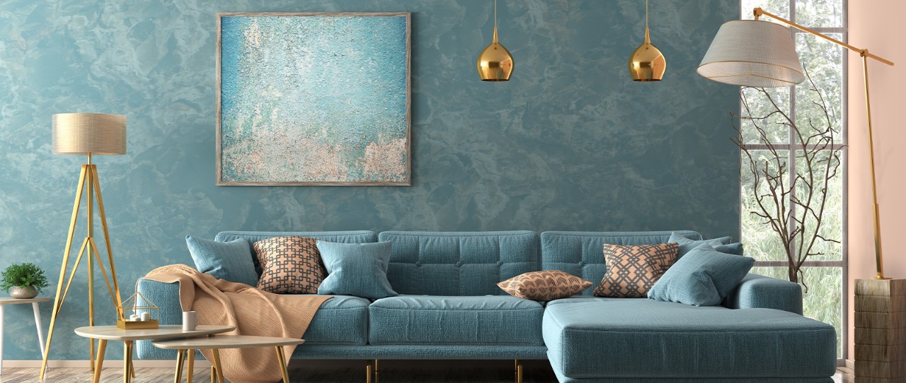 Teal living room with couch and floor lamp